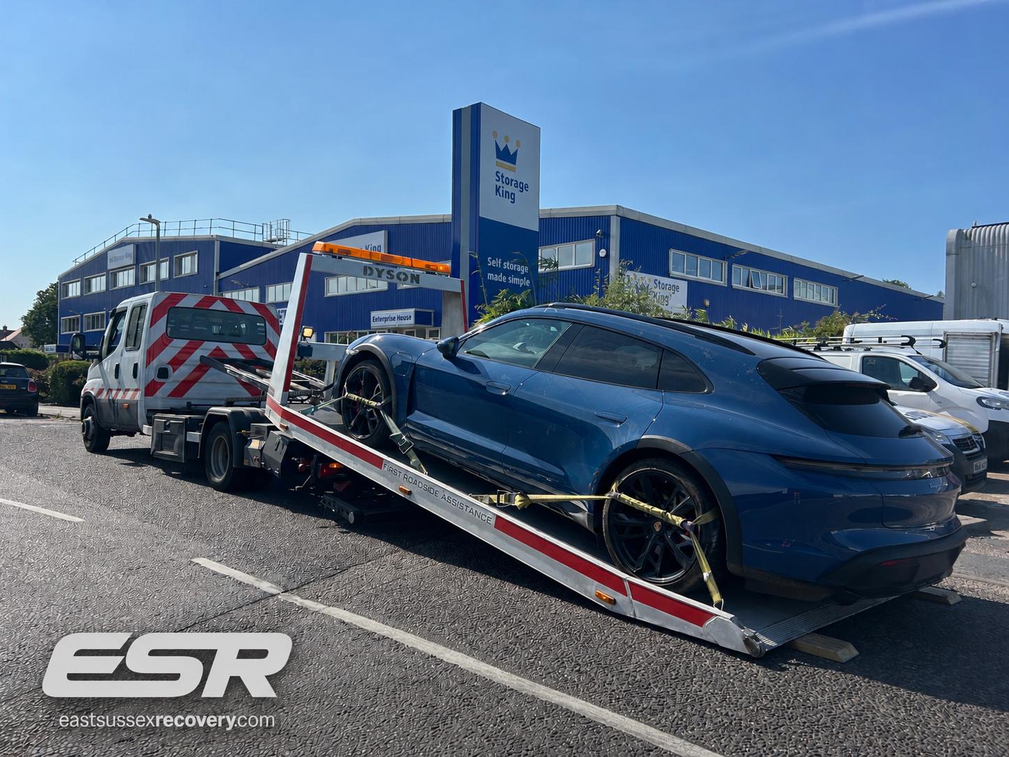 Porsche being transported by East Sussex Recovery